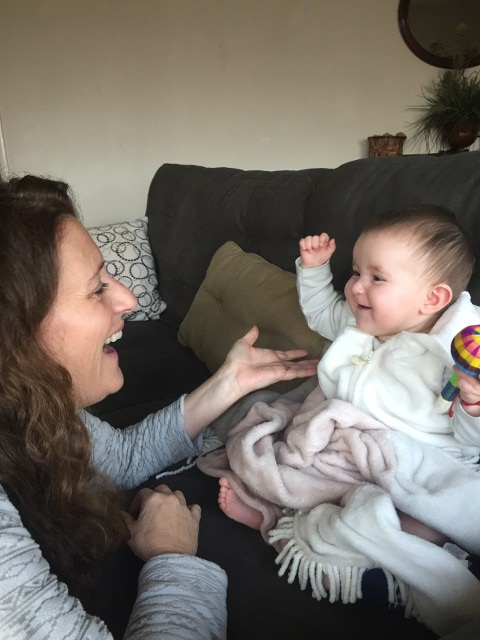 Woman Playing with Baby